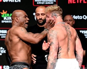 Mike Tyson slaps Jake Paul ahead of their clash in the ring on Friday, November 15 at the AT&T Stadium in Arlington, Texas