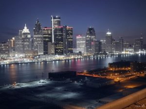 AI powered image to depict Detroit, Michigan at night / Michigan regulator moves to shut down MyBookie