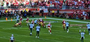 Image of a football game in Santa Clara, CA / DraftKings tipped for longer term revenue growth despite Q4 setbacks.