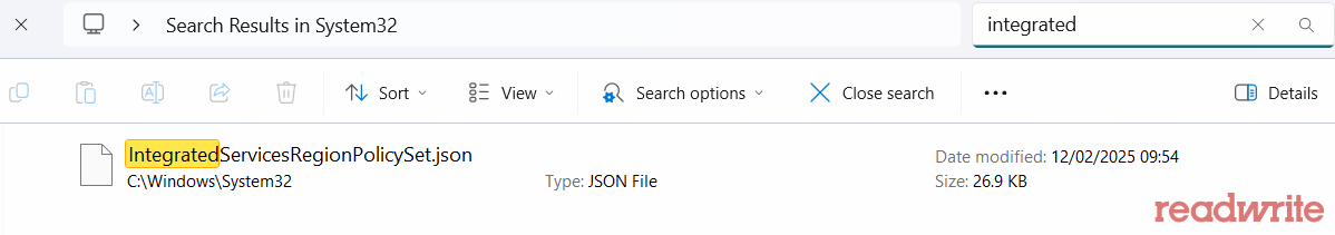 screenshot of File Explorer showing the search results in the System32 folder, highlighting the IntegratedServicesRegionPolicySet.json file. The file is located in C:\Windows\System32 and is categorized as a JSON file with a size of 26.9 KB. The "readwrite" watermark is visible in the bottom right corner.