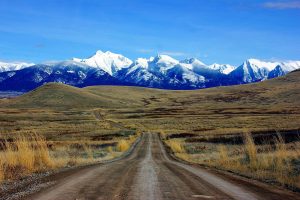 Mission Mountains National Bison Range Montana. Can see the track leading up to the mountains, with these in the background of the image.