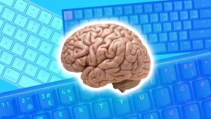 a brain overlayed on top of keyboards