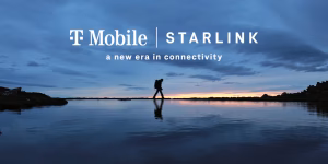 Landscape image of a beach at sunset with a person walking across it. T-Mobile Starlink logos in the center top of the image.