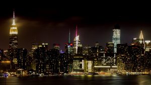 A portion of the New York City Skyline at nighttime viewed from the Hoxton Hotel in Williamsburg, NY. AUG2019