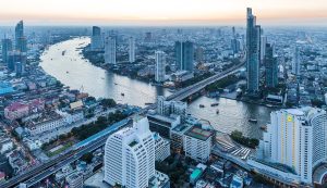 The Chao Phraya River passes through the Bang Rak business district in Bangkok, Thailand (2017). Viewed from State Tower on Silom Road.