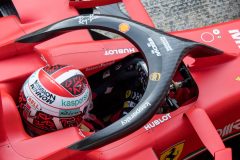 Ferrari driver sat in the car, can see the Halo.