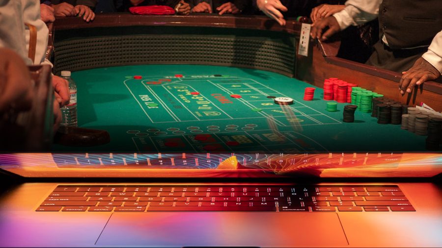 digtial craps represented by table and laptop