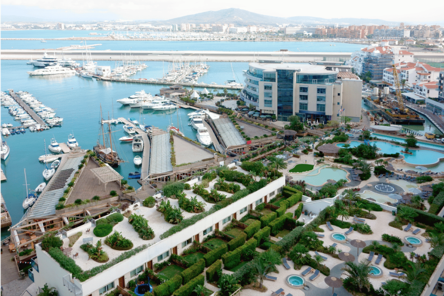 Arrest warrant issued after ex-Mansion CEO Karel Manasco skips sentencing in Gibraltar. Cityscape of Gibraltar
