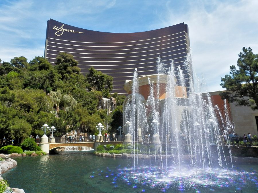 Las Vegas Wynn Resorts - can see the hotel in the background and trees and a water fountain in the foreground.
