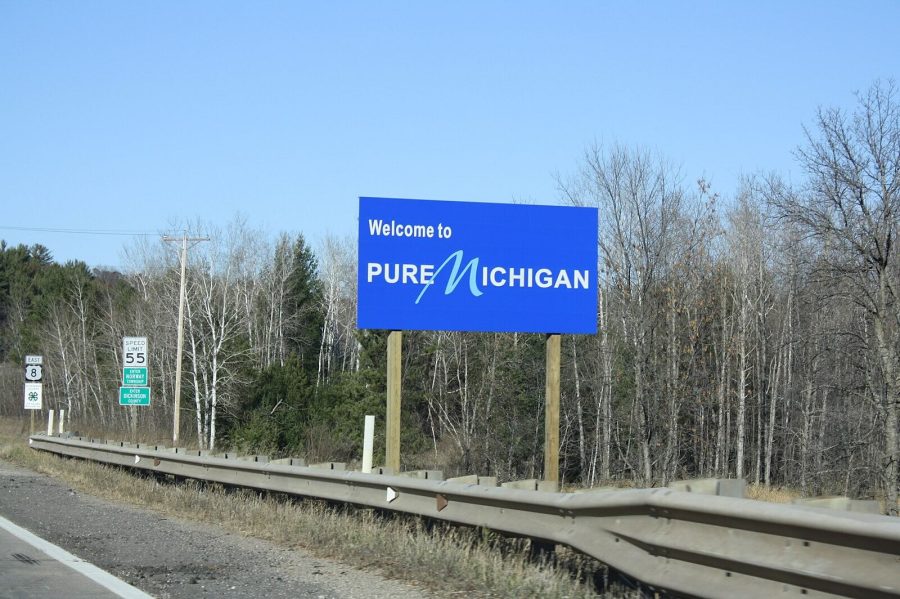 The "Welcome to Michigan" sign on US Highway 8 in Dickinson County, Michigan.