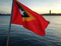 AI image to depict the flag of Timor-Leste, flying over its capital, Dili / The small Southeast Asian state of Timor-Leste has confirmed the expansion of its gambling sector with the award of the first offshore gaming license in the country. 