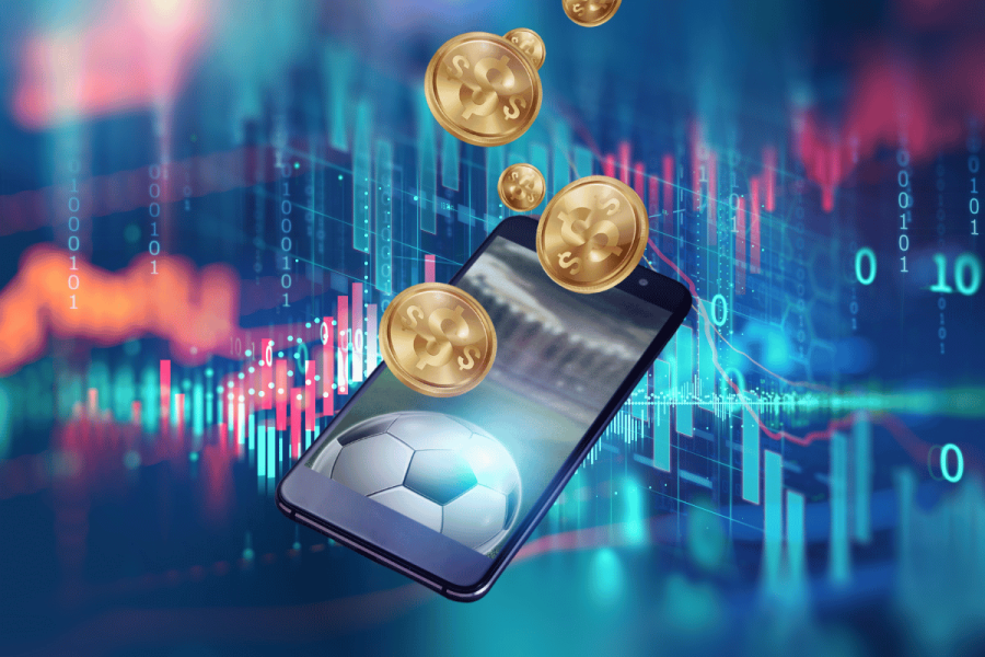 Why the rise in AI sports betting predictions comes with serious risks. A digital illustration showing gold coins with dollar signs falling into a smartphone screen displaying a soccer ball, set against a futuristic background of data charts, binary code, and glowing lines—symbolizing AI-driven sports betting and financial transactions in a digital environment.
