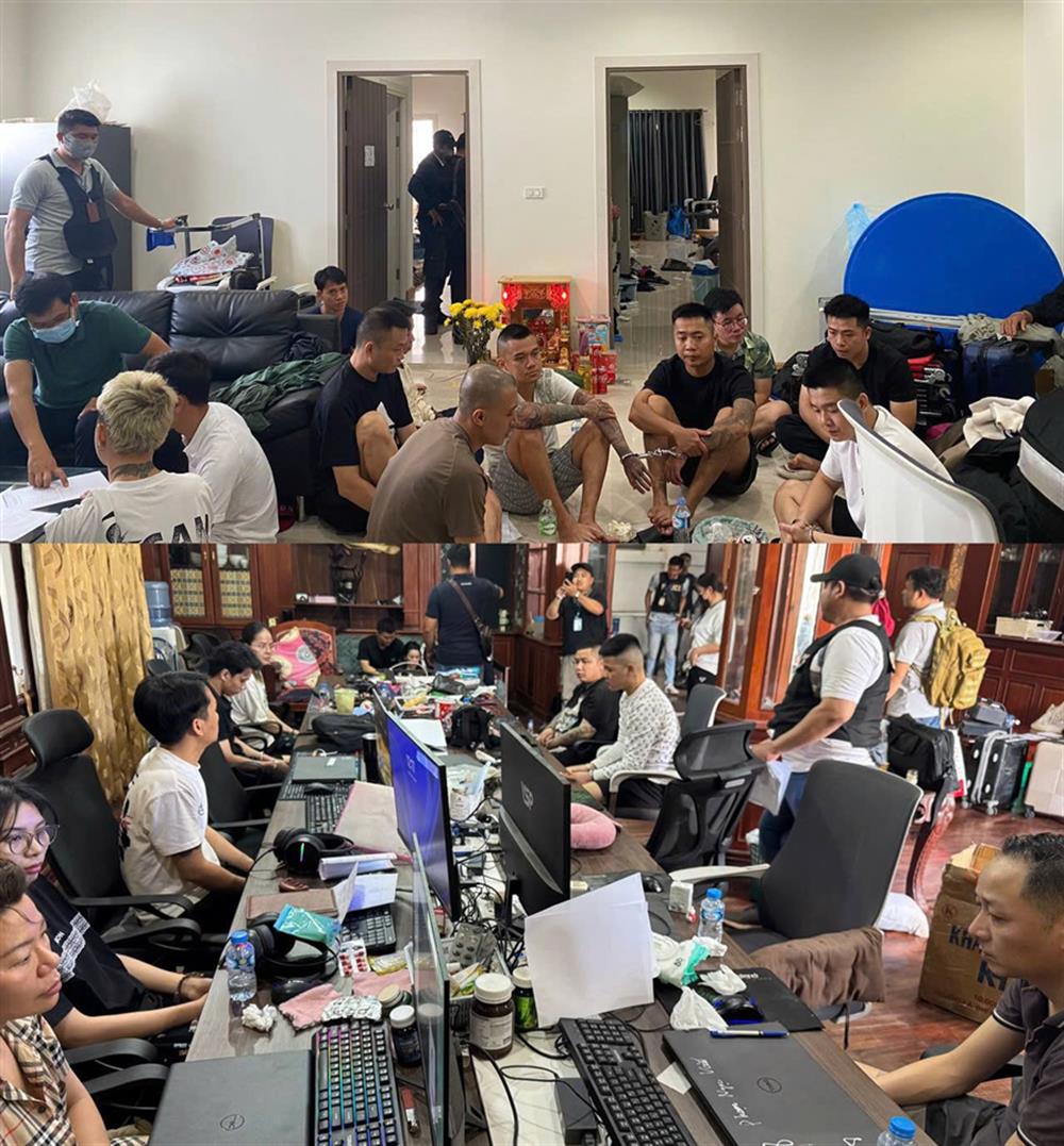 Groups of suspects from alleged online gambling syndicate sit on the floor and at computer stations during a Laos and Vietnam police raid, with officers present and various electronic devices visible.
