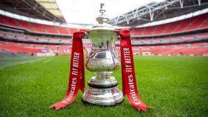 Image of the FA Cup trophy, on the pitch at Wembley. / The FA Cup final takes place at Wembley Stadium in London on Saturday, with Crystal Palace and Manchester City contesting the decider. 