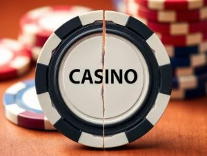 A casino chip shattered in half