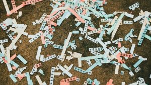 A range of raffle tickets lay on the ground in many colours