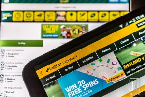 Betfair and Paddy Power issue statement to customers in wake of data leak. Image of someone playing on the Betfair platform on a tablet