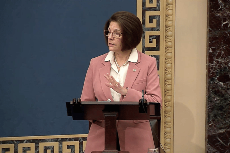 Senator Cortez Masto slams GOP for blocking FULL HOUSE Act gambling tax fix as Trump's Big Beautiful Bill passes. Senator Catherine Cortez Masto speaks at a podium on the Senate floor, wearing a pink blazer and glasses, gesturing with her hand.