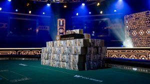 A stack of cash on a poker table.