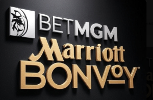 AI powered image showing the logos of BetMGM and Marriott Bonvoy / BetMGM has partnered with Marriott International to launch an exciting sweepstakes for NFL fans. 
