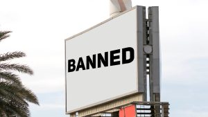 Philippines PAGCOR issues new ban on gambling billboards. Billboard with the words 'banned' written on it.