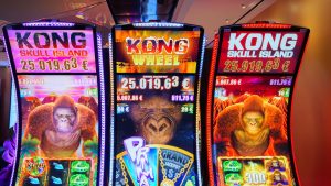 Light & Wonder Kong series. Three gambling machines lined up next to each other, with Kong on the screens. Light & Wonder reports huge 16% increase in net income for Q2