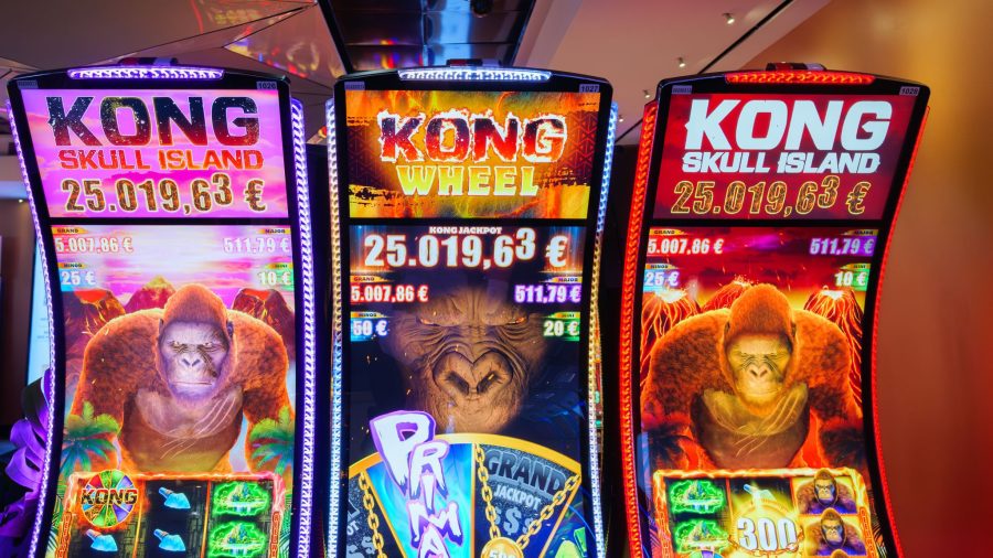 Light & Wonder Kong series. Three gambling machines lined up next to each other, with Kong on the screens. Light & Wonder reports huge 16% increase in net income for Q2