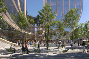 Soloviev and MoHegan, Freedom Plaza Plaza Entertainment and Games in New York City, signed a memorandum of understanding with the New York City Council on Gamps (NYCPG). A vital urban square with people sitting on green chairs and social communication under the shadows of trees. The background is a modern glass building with a vertical architectural fins. The glass facade reflects the sky and the surrounding areas, and words
