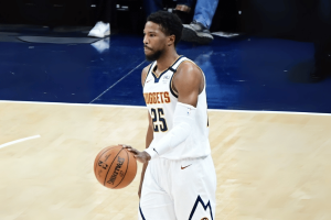 The American Professional League begins the independent investigation, Malik Pesley. Malik Pesley, wears the White Denver shirt number 25, dripping basketball during the American Professional League game.