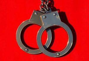 Fragon handcuffs on a prominent red background. South Korea returns to the Casino Casino, suspected of a campaign worth $ 3.8 billion