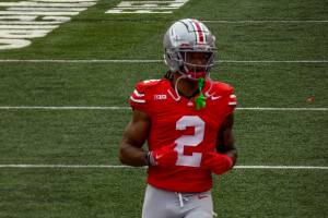 Receiver Emeka Egbuka on the field, close-up, wearing a red jersey with '2' written on the front in white.