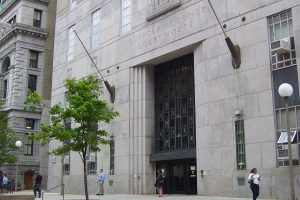 A Massachusetts couple was convicted of running underground casinos. 2008 photo of the Suffolk County Courthouse in Boston, Massachusetts, next to the Superior Judicial Council on Pemberton Square.