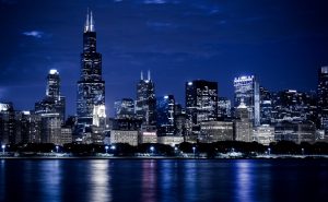 Chicago city skyline at night. Illinois' per-bet tax triggers sharp wagering decline, intensifying industry concerns