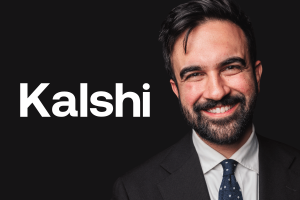Zohran Mamdani in a suit and tie stands against a black background beside large white text that reads “Kalshi.” Mamdani cites Kalshi forecasts amid surge toward New York Mayoral victory