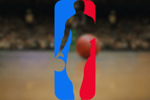 Self-professed addict jailed two years as NBA gambling scandal sentence delivered. NBA logo silhouette over blurred basketball court, illustrating professional basketball amid gambling scandal coverage.