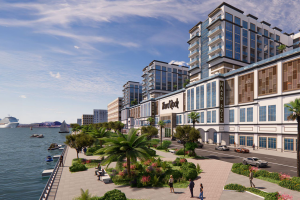 Hard Rock in San Juan rendering, building facing the water with a path and greenery between them. Hard Rock International reveals plans for hotel and casino in San Juan, first in Puerto Rico