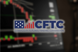 CFTC makes things clearer for prediction markets, as it withdraws event contracts ban. CFTC logo overlaid on blurred trading charts with red and green candlesticks, symbolizing regulatory changes affecting prediction and derivatives markets.