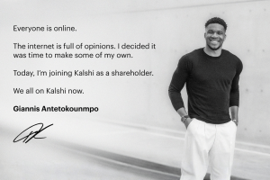 NBA Commissioner Silver calls Giannis' Kalshi investment minuscule amid prediction market debate. Black-and-white promotional image of Giannis Antetokounmpo standing against a light wall, smiling with his hands in his pockets, wearing a dark long-sleeve shirt and light pants. Text on the left reads: “Everyone is online. The internet is full of opinions. I decided it was time to make some of my own. Today, I’m joining Kalshi as a shareholder. We all on Kalshi now. Giannis Antetokounmpo,” followed by his signature.