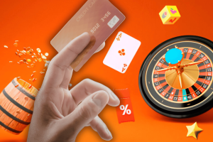 Credit card held over roulette wheel with poker chips and playing cards illustrating online gambling payments and betting risks. Do credit card gambling bans reduce harm or shift behavior Experts say there's always a loophole