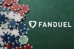 FanDuel approved for multi-state poker network expansion in Michigan market. FanDuel logo on green poker table with red white and blue casino chips stacked on felt background