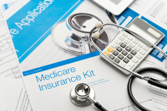 Medicare insurance enrollment documents with stethoscope and calculator, illustrating healthcare fraud investigations, Medicare reimbursement claims, medical billing and tax evasion cases. Burbank laboratory owner jailed after Medicare fraud funded gambling habit