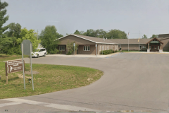 Grand Traverse Band of Ottawa and Chippewa Indians tribal office in Benzie County, Michigan, as the tribe pursues a federal lawsuit over Crystal Shores Casino gaming regulations.