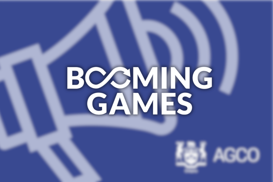 Booming Games logo alongside AGCO branding after Ontario regulator imposed $70,000 penalty over prohibited online slot auto-play functionality.