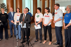Andrew Wilkie and gambling reform advocates at Parliament House calling for stronger gambling advertising restrictions and harm-reduction reforms.